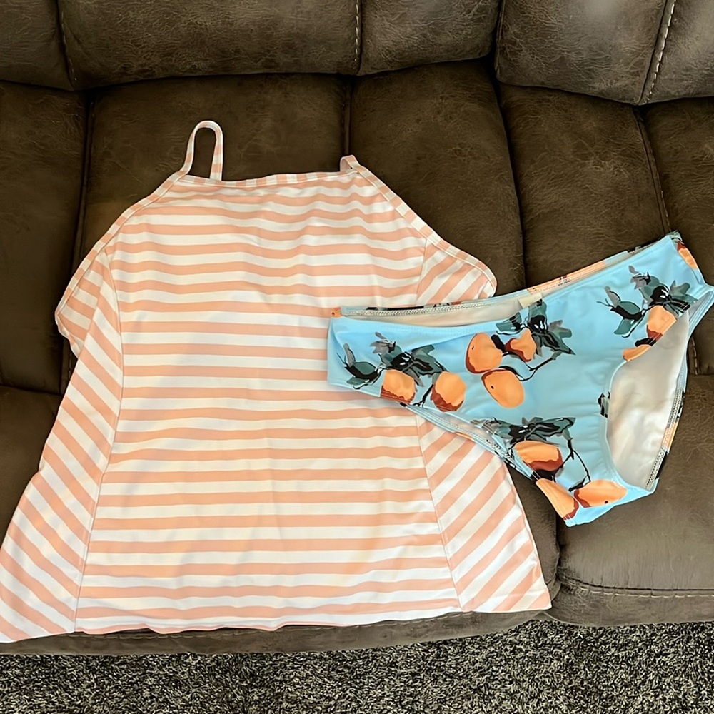 Brand new walkonbeach swimsuit. Size large. Still has tags.